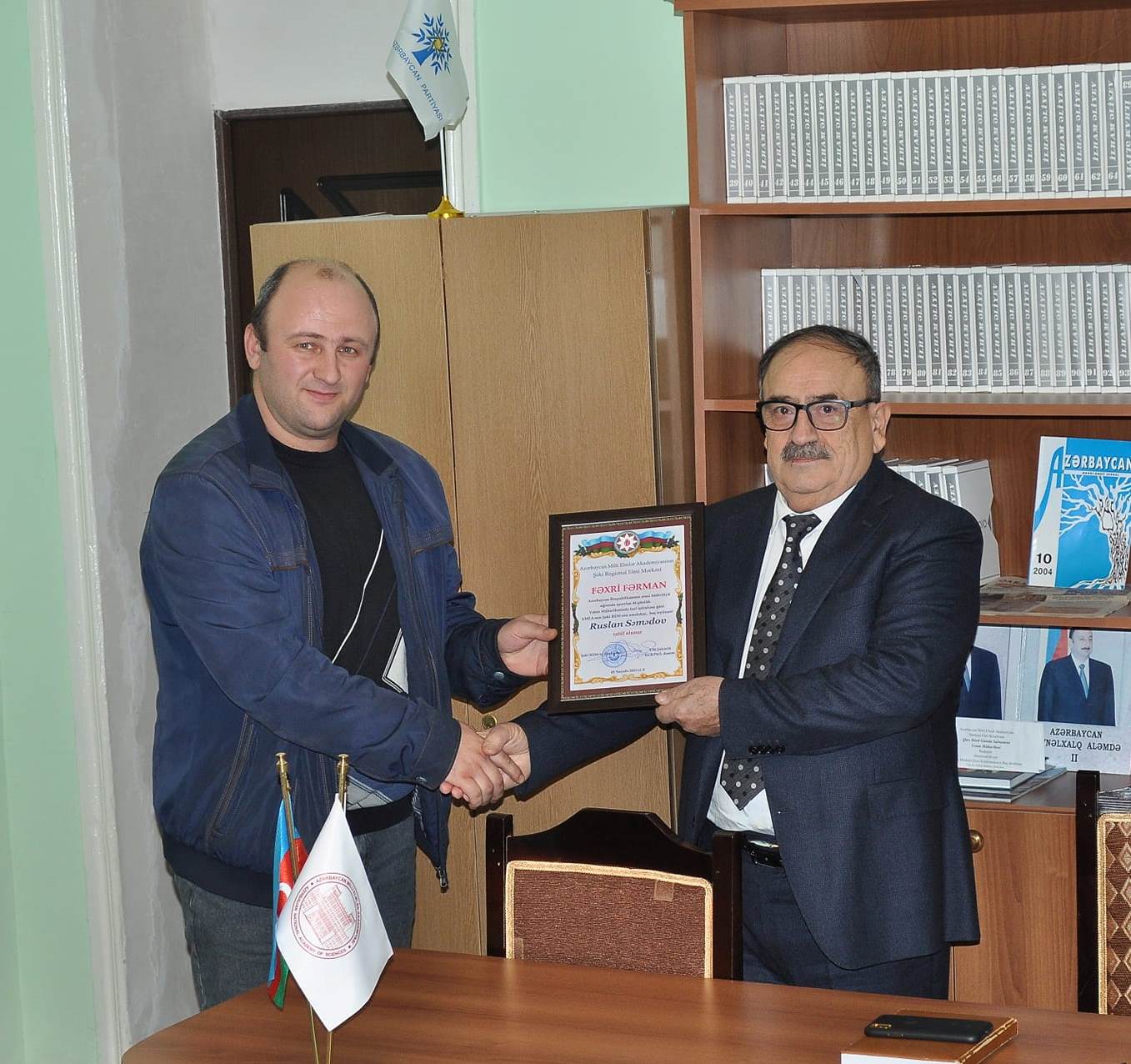An event was held on the occasion of "VICTORY DAY" and "STATE FLAG DAY" in the assembly hall of Sheki RSC of ANAS.